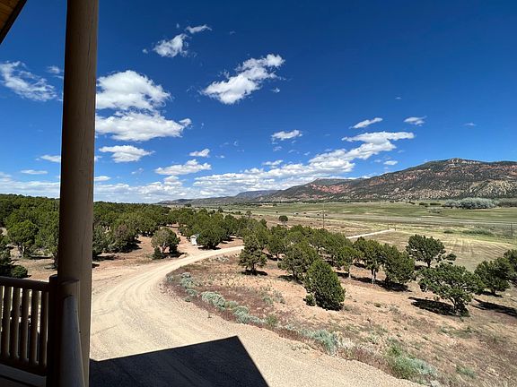 View from front wraparound deck to Kolob Mountains