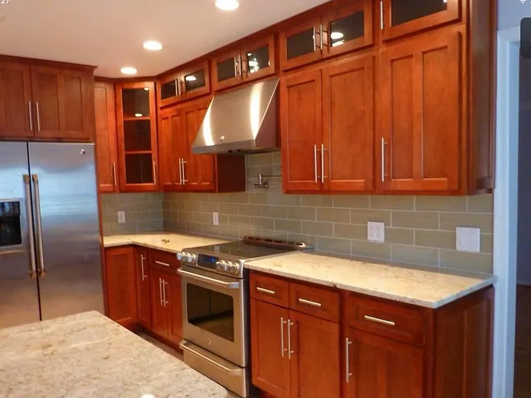 Remodeled kitchen with travertine floors