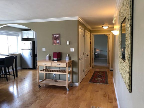 View of hallway and bedroom doorway