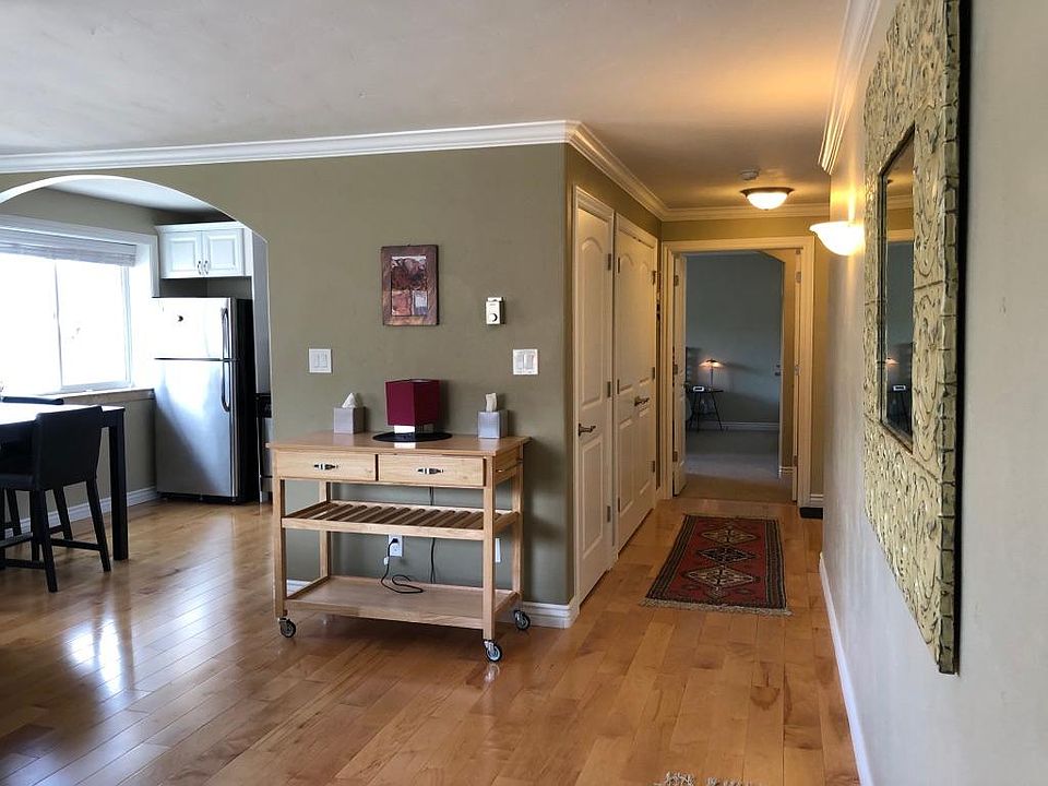 View of hallway and bedroom doorway