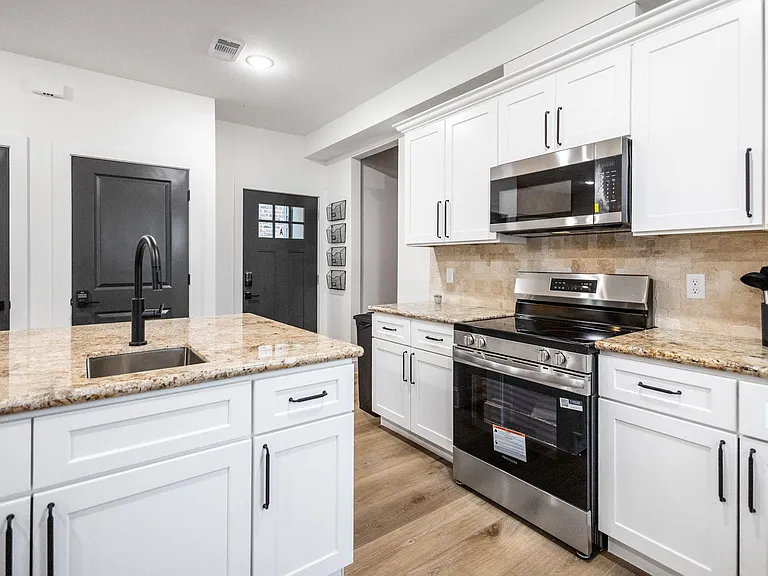 Second prep sink with dishwasher in the island