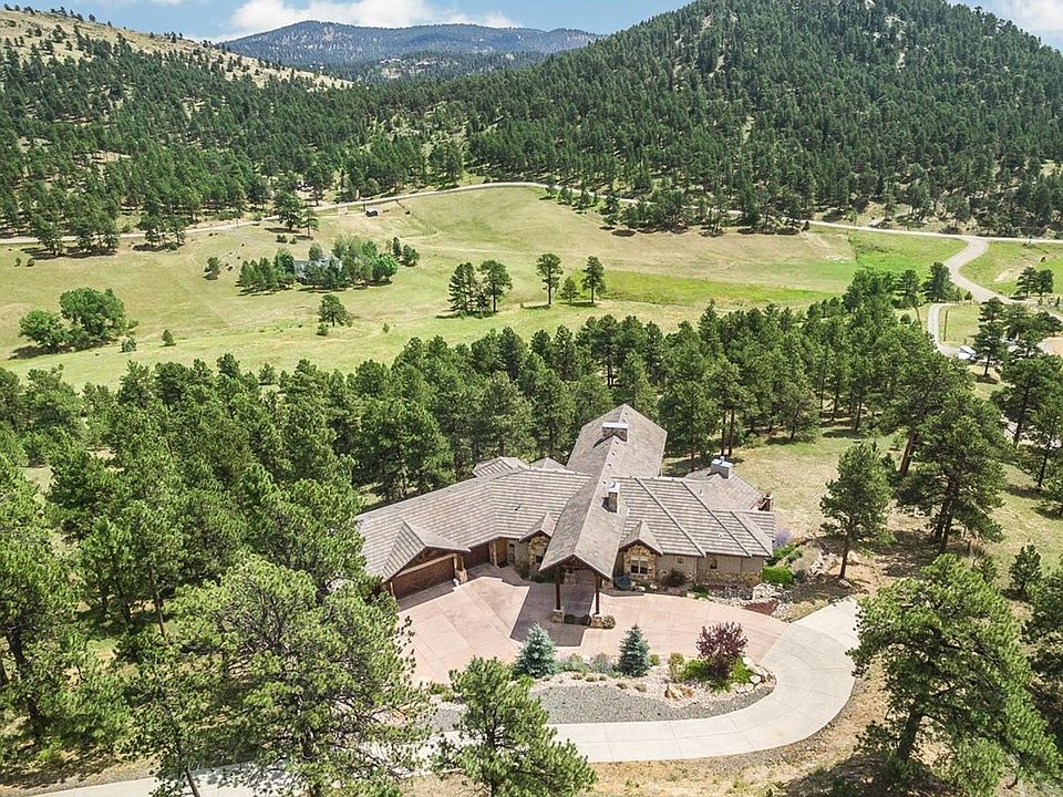 Beautiful 10 acre lot with timbered grand entrance.