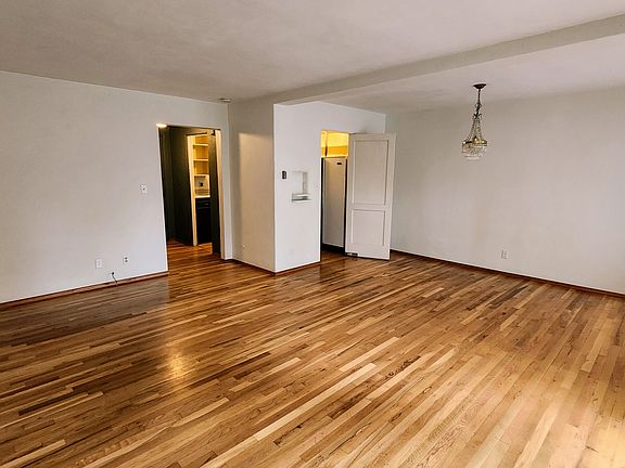 Living / dining room facing the kitchen