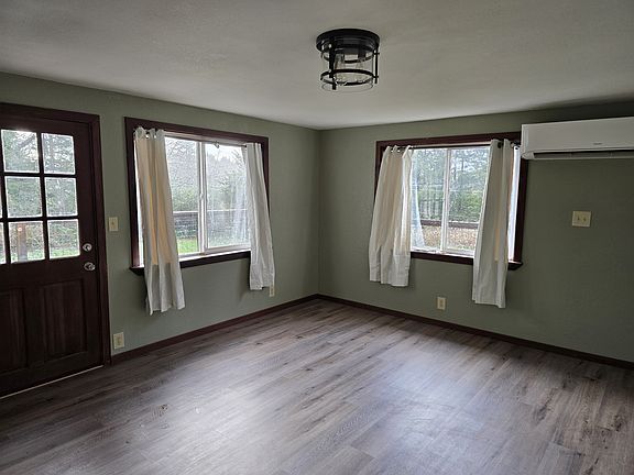 living room w ductless heater