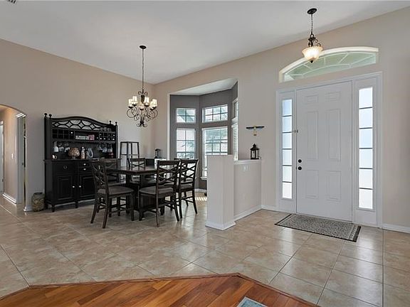 Bright entry foyer with tile flooring