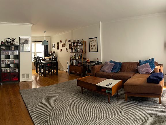 Living Room Facing East with Dining Area in the background