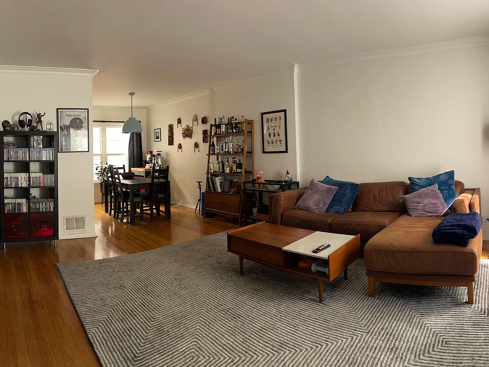 Living Room Facing East with Dining Area in the background