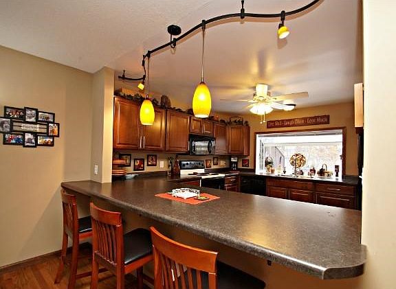 Newly remodeled and designed kitchen with breakfast bar.