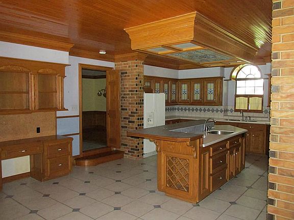 VIEW OF KITCHEN, CERAMIC TILE ISLAND WTIH SINK