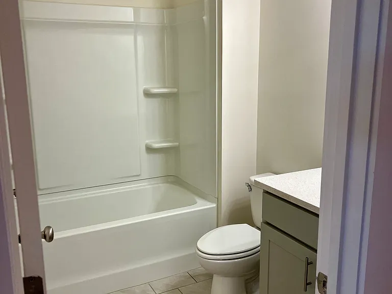 Full bathroom on 2nd floor for the two smaller bedrooms