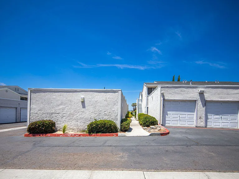 Residents' garages at the Presidio Villa Apartments in Vista, California.