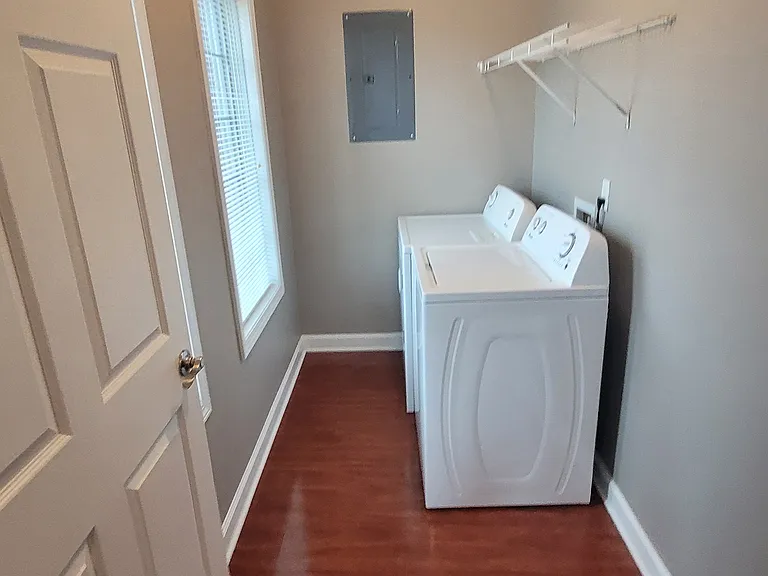 Laundry for building 5 and 6 off living room, 2 bedroom with DEN and 3 bedrooms