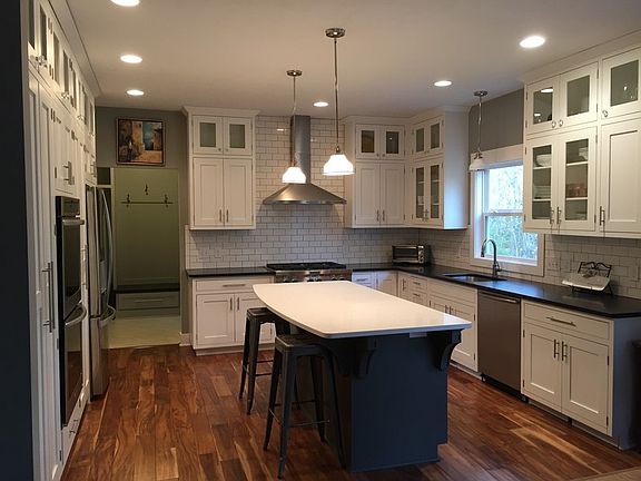 Upgraded kitchen - granite and quartz counters, 6 burner gas stove, double oven