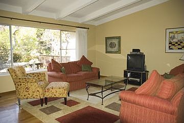 Vaulted ceilings with floor to ceiling windows