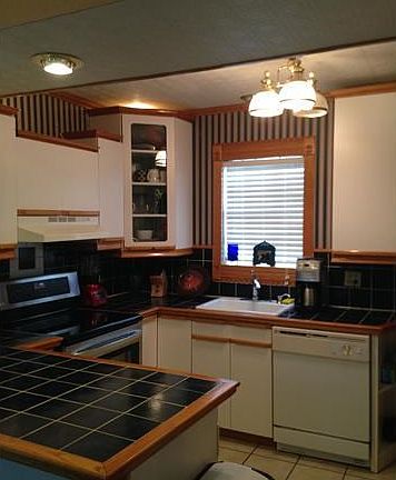 Kitchen. KITCHEN INCLUDES A DISHWAHER AND A NEW S/S STOVE.