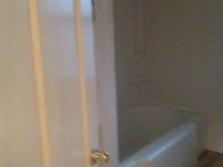 Bathroom, Main Floor with shower/tub/sink.