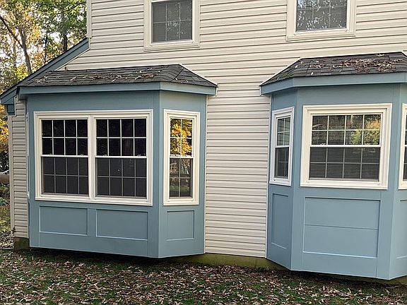 Bay windows in back of house