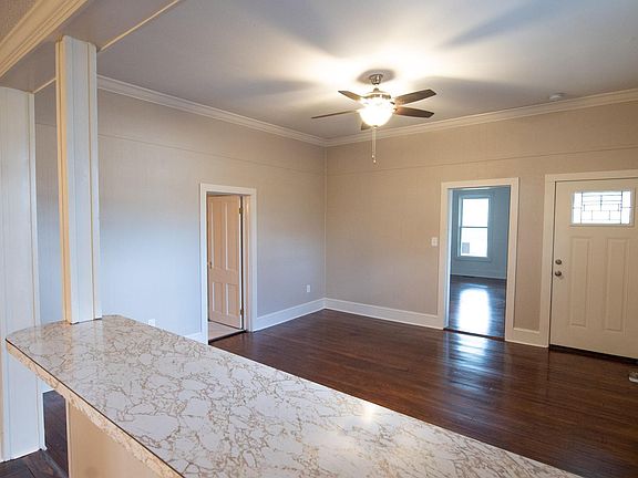 Den and front door entrance