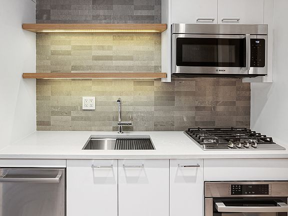 2nd image of 110 E 36th St APT 3E