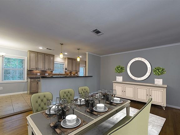Front room virtually staged as dining room.