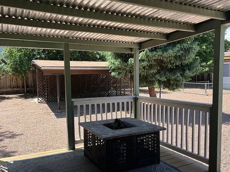 VIEW OF BACK YARD FROM PORCH