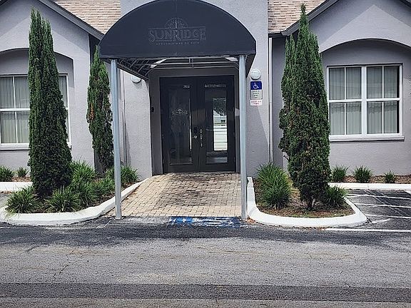 CLUB HOUSE ACROSS PARKING AREA