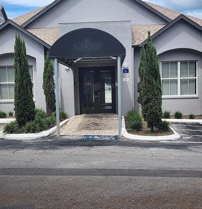 CLUB HOUSE ACROSS PARKING AREA