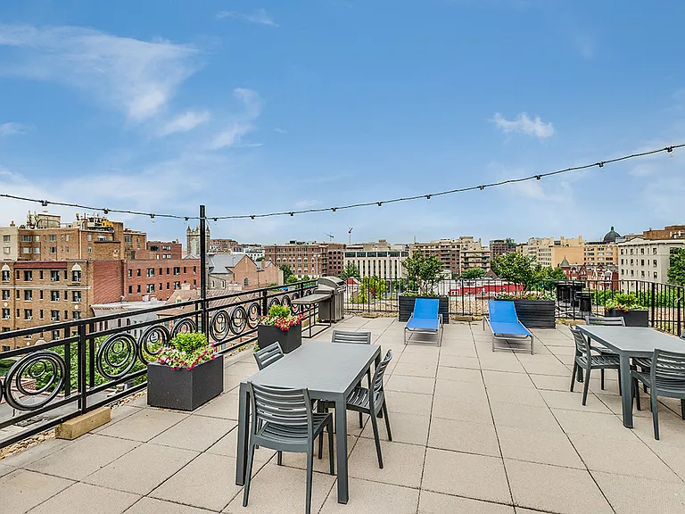 Rooftop deck with tables and seating