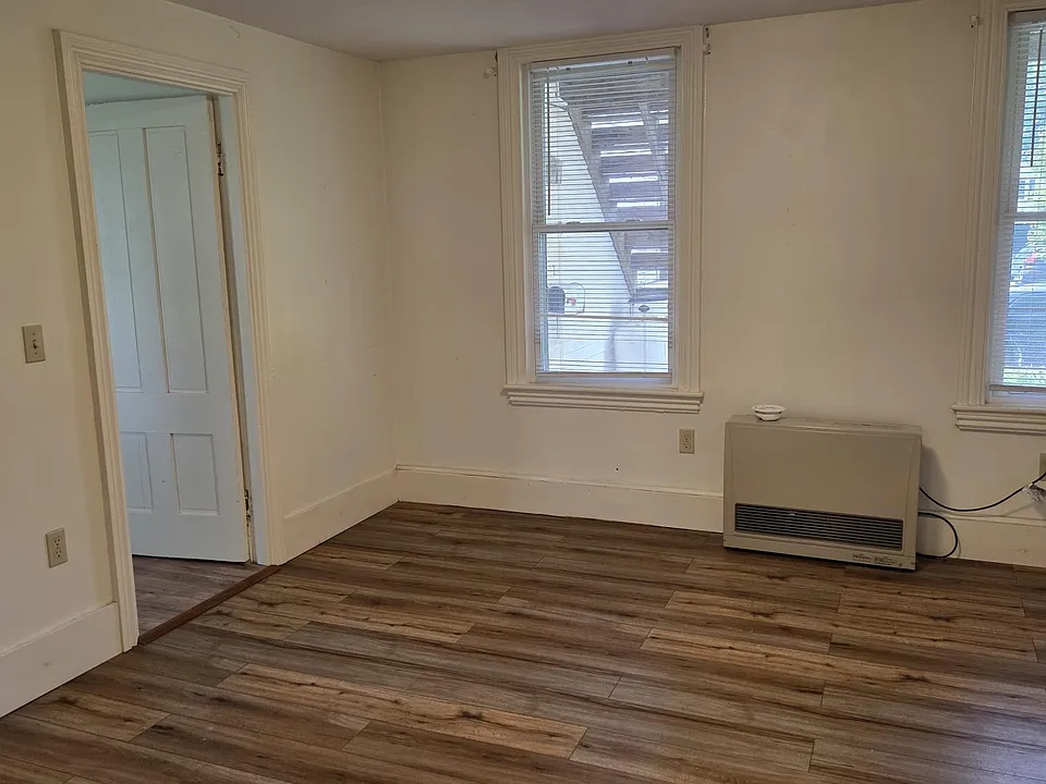 Living Room With Premium Laminate Flooring, Rannai Heat