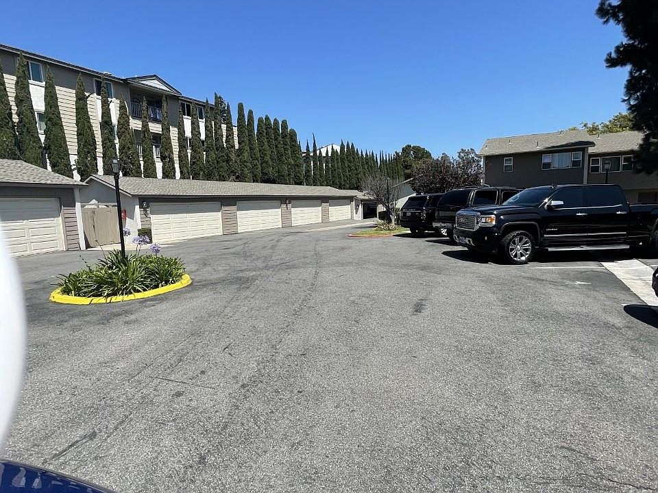 Extra on property guest parking with the addition of Private Reserved parking spaces for an additional fee. Ask for details. Keep in mind this residence comes with your own private 2 car garage.