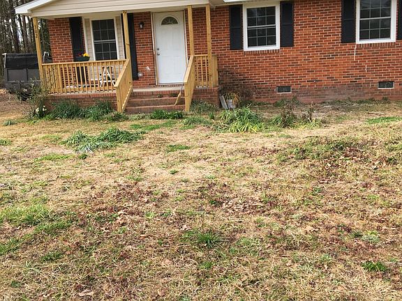 Brick home with small front porch