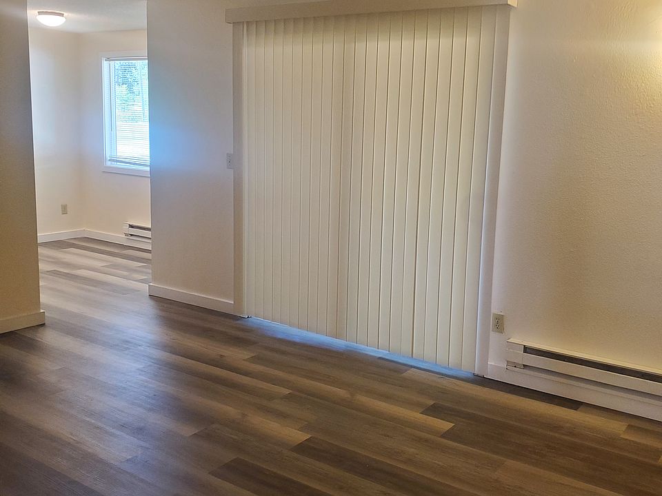 Nice living room are leading to back porch.