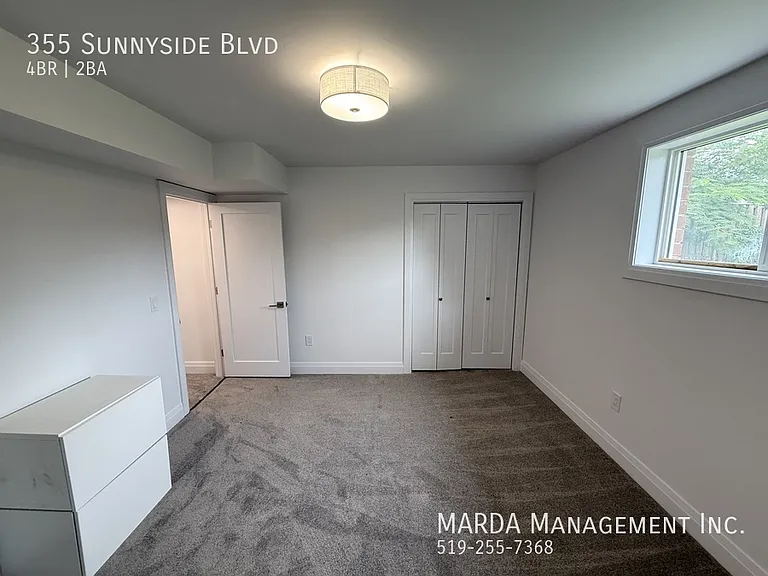 355 Sunnyside Blvd — Photo 52