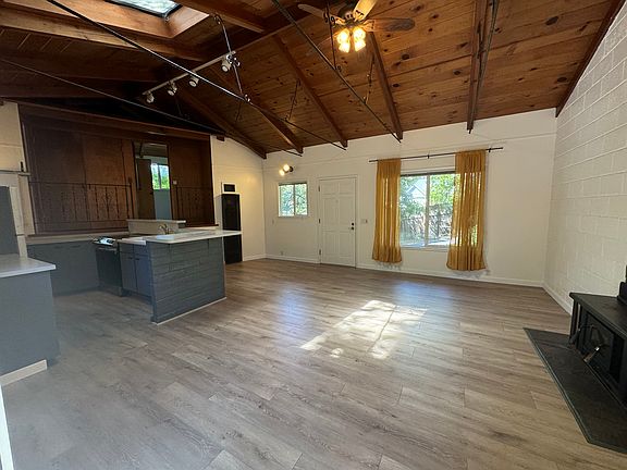 Open living room and kitchen area. Bedrooms above.