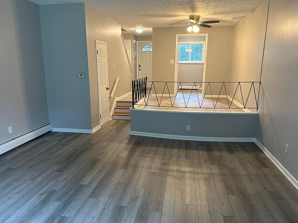 Dining and Living rooms with brand new flooring.