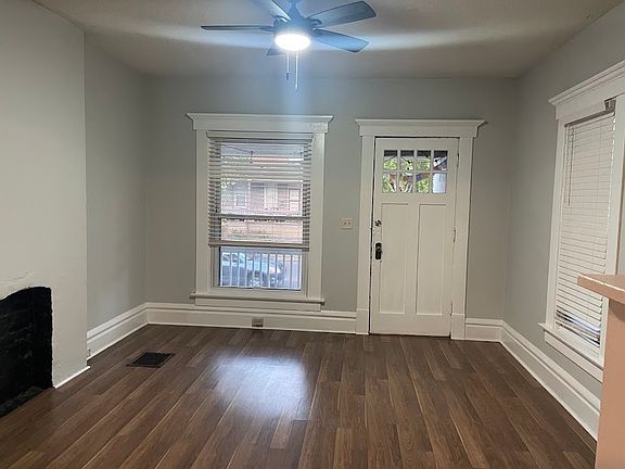 Spacious first floor family room, new ceiling fan and wood blinds