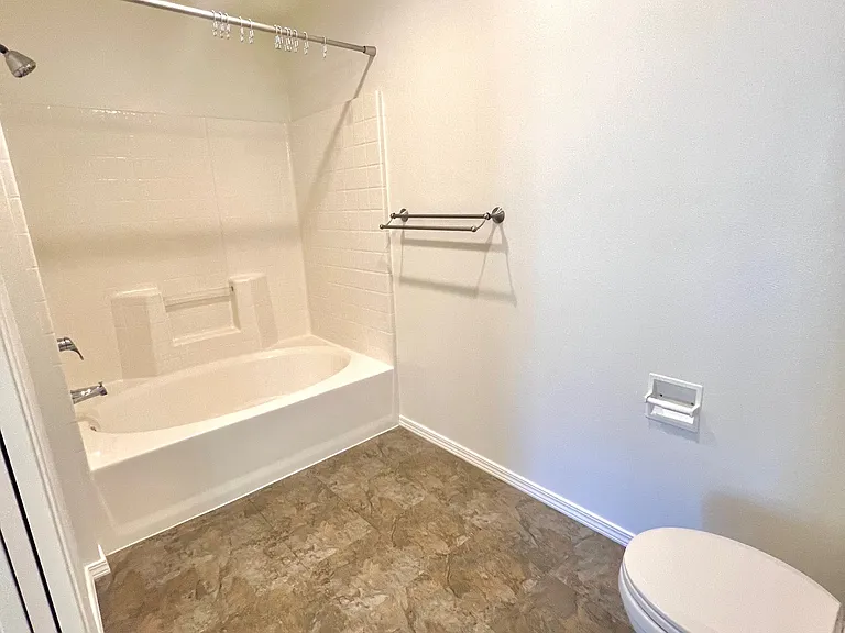 En suite bathroom with soaking tub