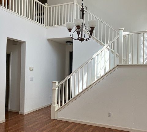 Dining room with high vaulted ceiling