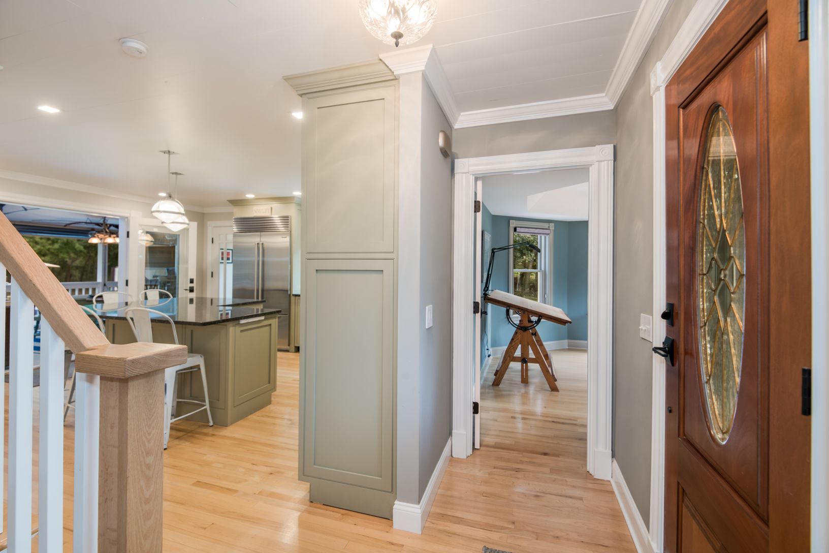 Entry Looking Toward Office to the Right and Kitchen Ahead. Stairway to Second Floor