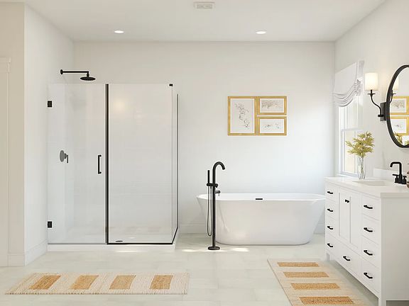 Primary bath with glass shower enclosure