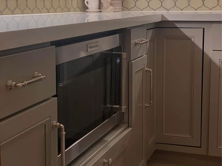 Thoughtful use of space to maximize use of new countertops and large kitchen island.