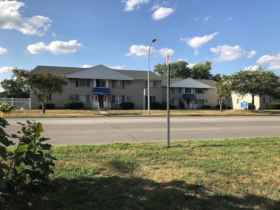 View of most of exterior frontage from across 9 Mile Rd.