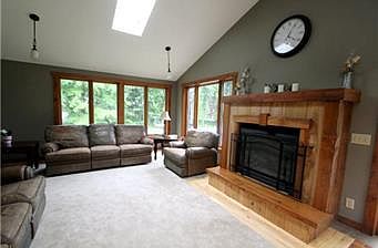 LR- fireplace, vaulted ceili