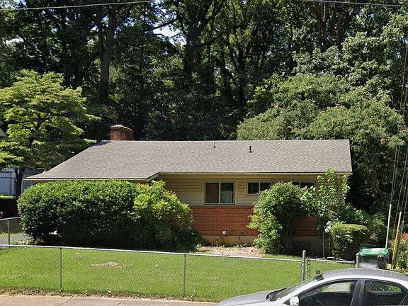 The entrance is on the right. This is before we began work landscaping. The spacious front lawn is the downstairs' tenants lawn--excellent for a dog.