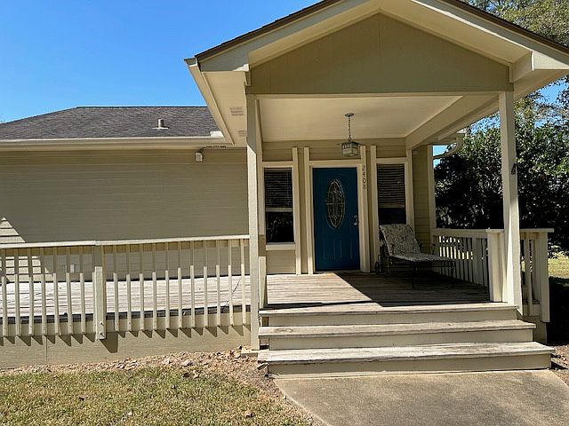 Front of the house with covered deck -- 2408 Ave I