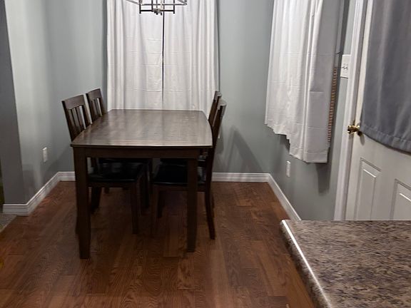 Curtains are included , dining room table if needed