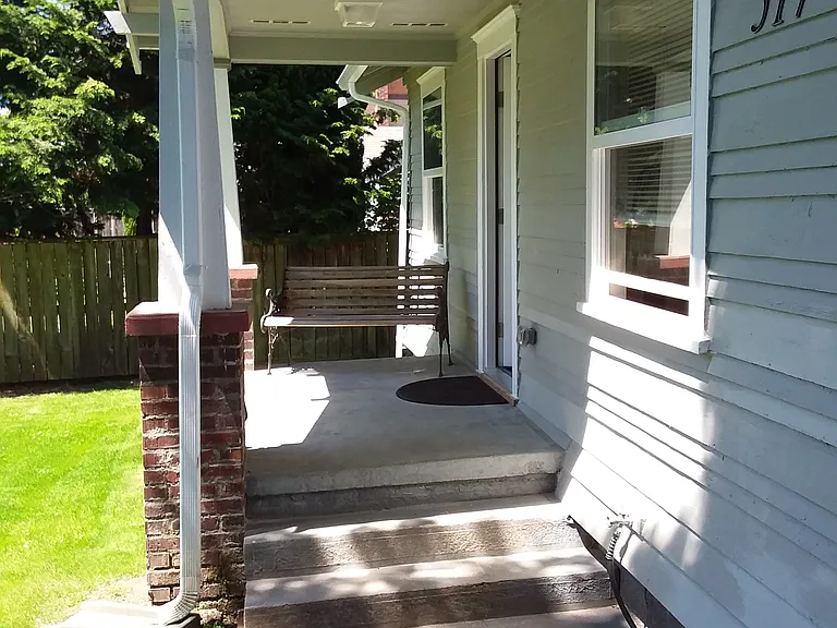 Paver sidewalk to covered front porch