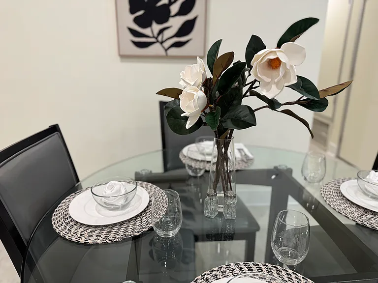 Dining area with dishes and utensils included