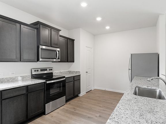 The kitchen of the Reed has wonderful wood cabinetry.