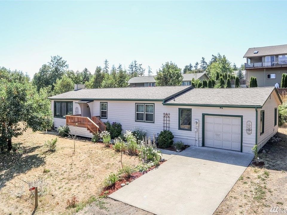 Home sits comfortably on 2 parcels. Deep 1 car garage which could also serve as a shop.